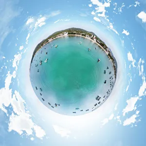 Little Planet Image above Fishing Boats Resting on the Beach of Phu Quoc Island, Vietnam Little Planet Image above Fishing Boats Resting on the Beach of Phu Quoc Island, Vietnam