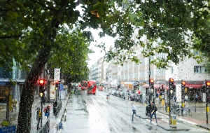 London street scene through rain-soaked bus windows, London, England, United Kingdom London street scene through rain-soaked bus windows, London, England, United Kingdom