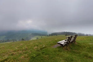 Observation Gallery: Lonely bench on Herzogenhorn mountain, clouds, southern Black Forest, Baden-Wuerttemberg, Germany