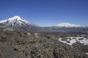 Lonquimay volcano, left, and Tolhuaca volcano, Lonquimay, Region de la Araucania, Chile Lonquimay volcano, left, and Tolhuaca volcano, Lonquimay, Region de la Araucania, Chile