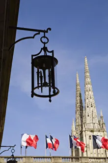 Low angle view of a church, Hotel De Ville, St. Andre Cathedral, Bordeaux, Aquitaine Low angle view of a church, Hotel De Ville, St. Andre Cathedral, Bordeaux, Aquitaine