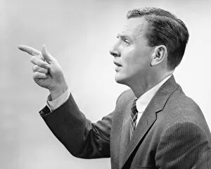 Shirt And Tie Collection: Man pointing with index finger, posing in studio, (B&W), close-up