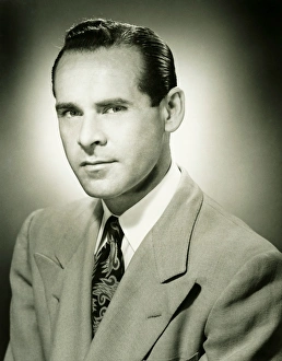Serious man posing in studio, (B&W), (Close-up), (Portrait) Serious man posing in studio, (B&W), (Close-up), (Portrait)