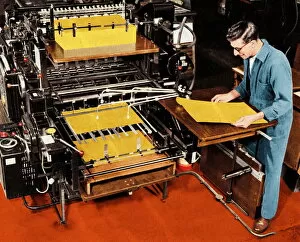 Images Dated 6th November 2012: Man Working at a Printing Press