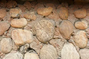 Mani stones with Tibetan inscriptions on wall, Buddhist Mani wall at Ghami, Upper Mustang, Nepal, Asia Mani stones with Tibetan inscriptions on wall, Buddhist Mani wall at Ghami, Upper Mustang, Nepal, Asia