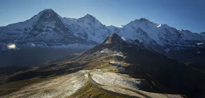 <b class=qtipBold><figcaption>Mannlichen</figcaption></b><br>The Eiger, Monch, and Jungfrau mountains rise above Mannlichen in central Switzerland.<br><em>© 2016 Chase Dekker Wild-Life Images</em> Mannlichen