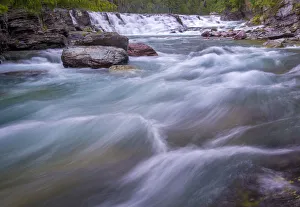 <b class=qtipBold><figcaption>McDonald Creek</figcaption></b><br>Flowing waters of McDonald Creek that empty into Lake McDonald<br><em>© Russell Burden</em> McDonald Creek