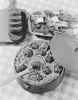 Meatballs with beans in stew pot, close-up Meatballs with beans in stew pot, close-up