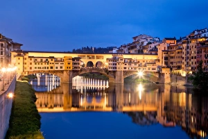 <b class=qtipBold><figcaption>Medieval Reflections</figcaption></b><br>Arno River reflect bright colours of buildings surrounding Ponte Vecchio.<br><em>© Jon and Tina Reid</em> Medieval Reflections