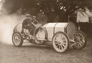 Two men driving race car (B&W sepia tone) Two men driving race car (B&W sepia tone)