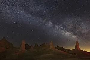Milky Way and tufa towers of Trona Pinnacles at night, Mojave Desert, California, USA Milky Way and tufa towers of Trona Pinnacles at night, Mojave Desert, California, USA