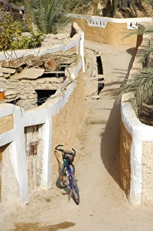 Modern bike parking in a lane in the Old town of Ghadames, UNESCO world heritage, Libya Modern bike parking in a lane in the Old town of Ghadames, UNESCO world heritage, Libya