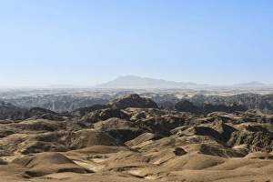 Moon Valley, cliffs furrowed by erosion, Namib-Naukluft Park, Namib Desert, Namibia Moon Valley, cliffs furrowed by erosion, Namib-Naukluft Park, Namib Desert, Namibia
