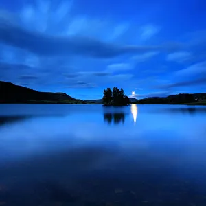 Moonrise crannog loch hill glen night Scotland Moonrise crannog loch hill glen night Scotland