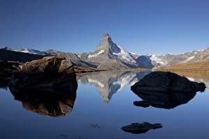Morning mood with the Matterhorn reflected in Lake Stellisee, Zermatt, Valais, Swiss Alps Morning mood with the Matterhorn reflected in Lake Stellisee, Zermatt, Valais, Swiss Alps