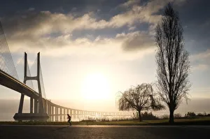 <b class=qtipBold><figcaption>Morning Run Landscape</figcaption></b><br>Early morning run by the bridge<br><em>© Paulo Alberto Silva</em> Morning Run Landscape