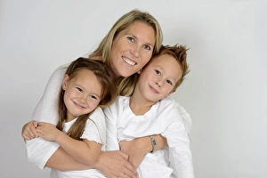 Mother with her two children, boy and girl Mother with her two children, boy and girl