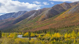 Mountain landscape with stream near Brooks Range, Alaska, USA Mountain landscape with stream near Brooks Range, Alaska, USA