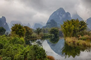 Mountains and Li River in fog, Yang Shou, China Mountains and Li River in fog, Yang Shou, China
