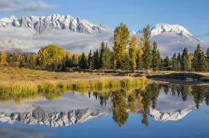 Mt. Moran and Teton Range reflecting in channel of Snake River, Schwabacher Landing Mt. Moran and Teton Range reflecting in channel of Snake River, Schwabacher Landing