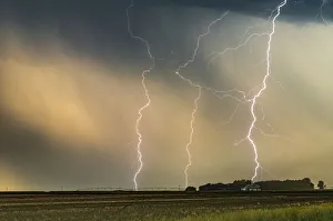 Multiple Lightning strikes hit a ranch in Nebraska at sunset, USA Multiple Lightning strikes hit a ranch in Nebraska at sunset, USA