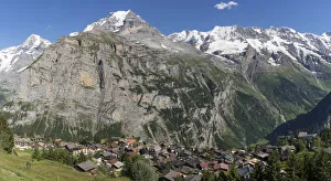Murren village above Lauterbrunnen Valley with Monch mountain in background, Swiss Alps Murren village above Lauterbrunnen Valley with Monch mountain in background, Swiss Alps