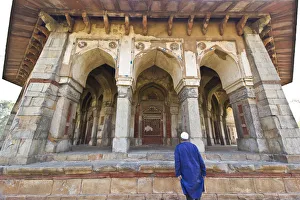 Muslim Tourist entering the gate of Isa Khan Niyazis Tomb Muslim Tourist entering the gate of Isa Khan Niyazis Tomb