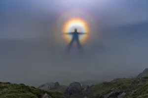 Natural phenomena, Brocken spectre on Helm Crag. Lake District National park. UK Natural phenomena, Brocken spectre on Helm Crag. Lake District National park. UK