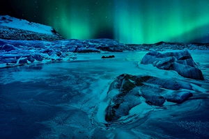 Related Images Gallery: Northern light over frozen Skaftafell glacier lake
