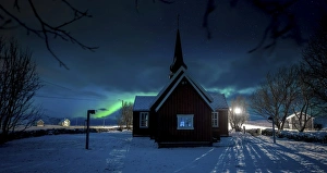 <b class=qtipBold><figcaption>Norwegian Church and Aurora</figcaption></b><br>Church silhouetted against the night sky with the aurora in the background during Winter.<br><em>© 2015 David N Moorhouse</em> Norwegian Church and Aurora