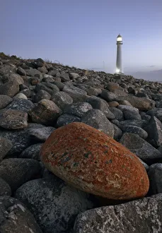 The Odd One Out, a single rock stands out of the landscape at the Kommetjie Lighthouse in The Odd One Out, a single rock stands out of the landscape at the Kommetjie Lighthouse in