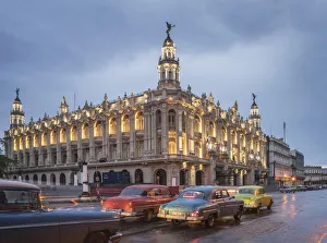 Old American cars and the Cuban National Theater Old American cars and the Cuban National Theater