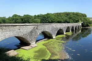 Images Dated 6th July 2013: Old eight arch bridge in welsh countryside