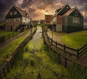 Old dutch houses and canals at Volendam, Netherlands Old dutch houses and canals at Volendam, Netherlands