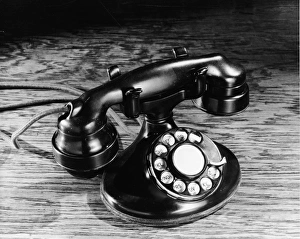 <b class=qtipBold><figcaption>Old-Fashioned Black Rotary Telephone</figcaption></b><br>Still life of an old-fashioned black rotary telephone, 1930s. (Photo by Hulton Archive/Getty Images)<br><em>© 2004 Getty Images</em> Old-Fashioned Black Rotary Telephone