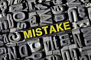 Old lead letters forming the word Mistake Old lead letters forming the word Mistake