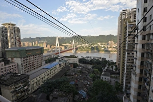Old and new high-rises at the Yangtze cable car, on the Yangtze River, Chongqing, China Old and new high-rises at the Yangtze cable car, on the Yangtze River, Chongqing, China