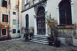 Old town street in San Marco quarter of Venice at the morning Old town street in San Marco quarter of Venice at the morning