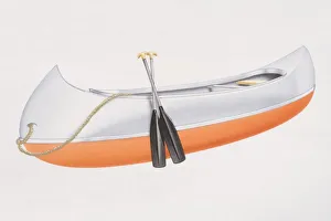 Orange and white Canadian canoe with two paddles leaning on the side Orange and white Canadian canoe with two paddles leaning on the side