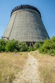 Outside unfinished cooling tower in the Chernobyl Exclusion Zone, Pripyat, Ukraine Outside unfinished cooling tower in the Chernobyl Exclusion Zone, Pripyat, Ukraine