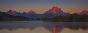 <b class=qtipBold><figcaption>Oxbow Alepnglow</figcaption></b><br>The Teton range gets a burst of alpenglow during an early morning at Oxbow Bend. Taken in Grand Teton National Park, Wyoming.<br><em>© 2014 Chase Dekker Wild-Life Images</em> Oxbow Alepnglow