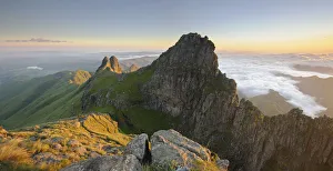 Panoramic view of mountain peak at dawn in the Drakensberg, Free State Province Panoramic view of mountain peak at dawn in the Drakensberg, Free State Province