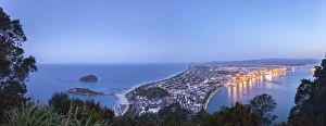 Panoramic view of the town of Mount Maunganui and the Port of Tauranga at nightfall Panoramic view of the town of Mount Maunganui and the Port of Tauranga at nightfall