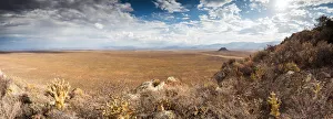 Panoramic views over the Tankwa Karoo Desert with dramatic thunderclouds in the sky Panoramic views over the Tankwa Karoo Desert with dramatic thunderclouds in the sky