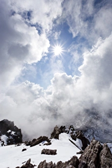 On the peak of Lorcherspitz mountain above lake Gruensee, low stratus, province of Bolzano-Bozen, Italy, Europe On the peak of Lorcherspitz mountain above lake Gruensee, low stratus, province of Bolzano-Bozen, Italy, Europe