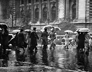 Pedestrian passing street, rainy weather, New York, USA (B&W) Pedestrian passing street, rainy weather, New York, USA (B&W)