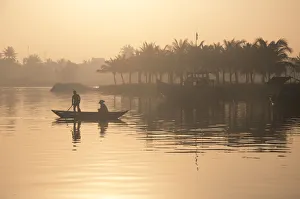 People on the boat in early morning in Hoian, Vietnam People on the boat in early morning in Hoian, Vietnam