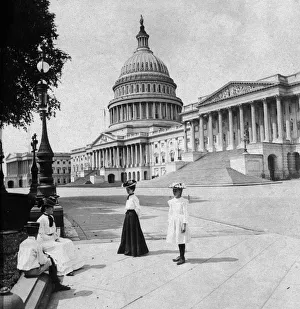 <b class=qtipBold><figcaption>People Outside US Capitol Building</figcaption></b><br>Exterior of the Capitol building with women and children gathered outdoors, Washington D.C., 1910s. (Photo by Hulton Archive/Getty Images)<br><em>© 2003 Getty Images</em> People Outside US Capitol Building