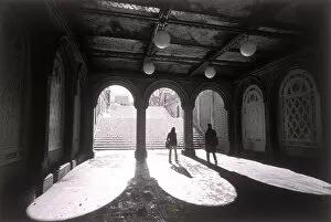 Midtown Gallery: People walking underneath terrace in Central Park