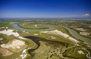 Petit-Rhone shortly before it joins the Mediterranean Sea, meander, Saintes-Maries-de-la-Mer, Camargue Petit-Rhone shortly before it joins the Mediterranean Sea, meander, Saintes-Maries-de-la-Mer, Camargue